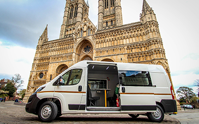 Welfare van outside Lincoln Cathedral with side door open