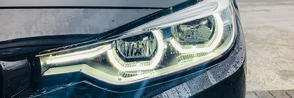 BMW headlight in the rain