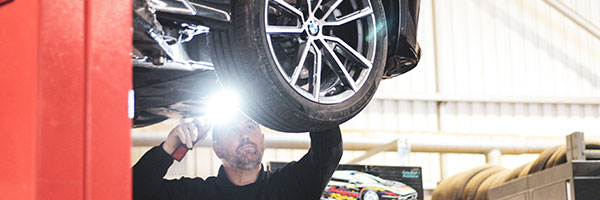BMW wheel being checked at Dack Motor Group Lincoln